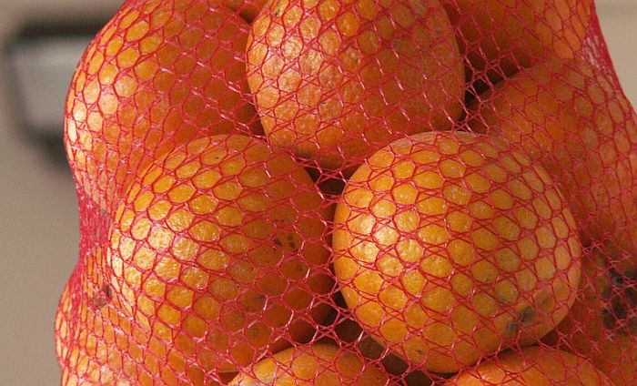 Zašto se pomorandže pakuju u crvene mrežice?